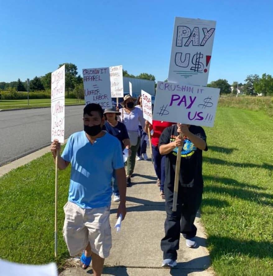 Screen Shop Workers Protest Outside of Building Following Layoffs