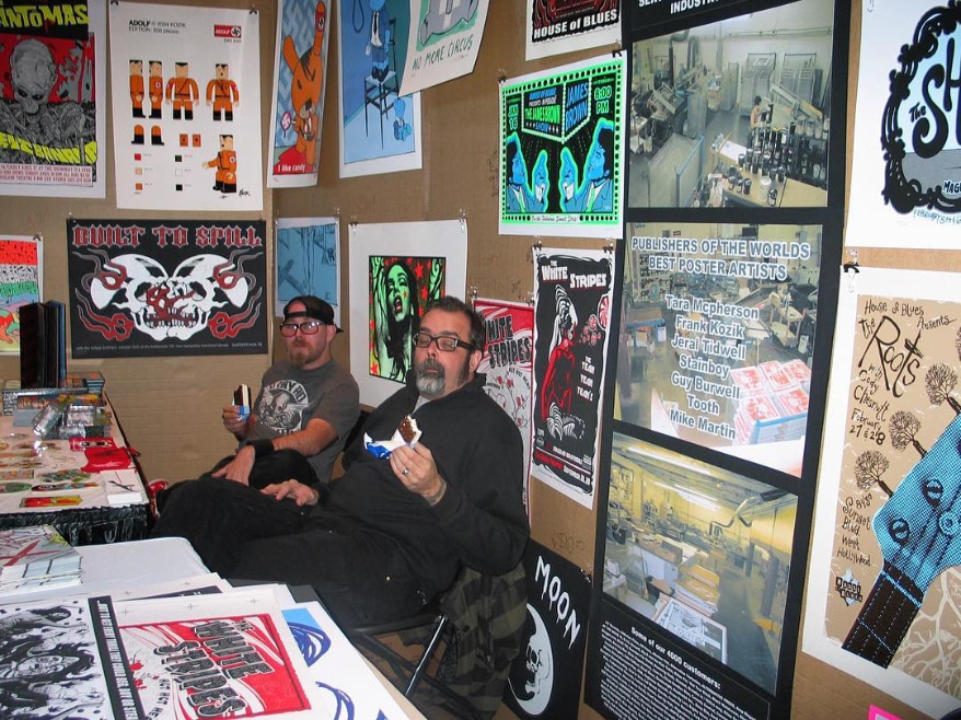 Richie and the late Frank Kozik at one of the first Flatstock rock poster Shows at Bumbershoot in Seattle, 2004.